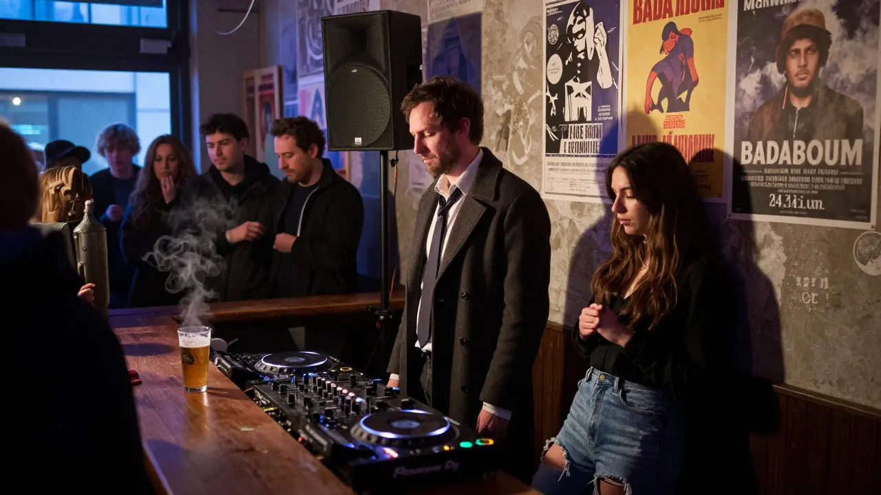 Early morning at Badaboum, a man pressed against a speaker as ambient music fills the quiet room.